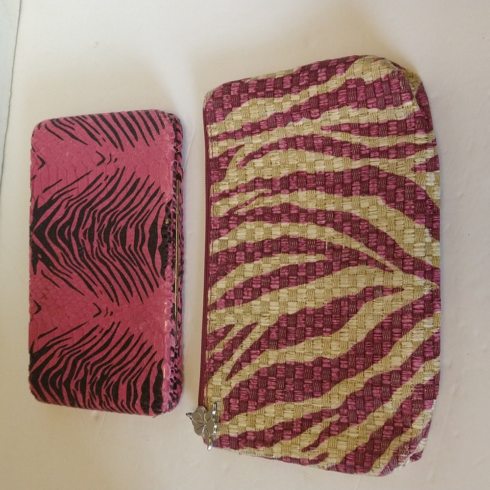NWOT. Set up two. One cosmetic case and one hard case wallet.